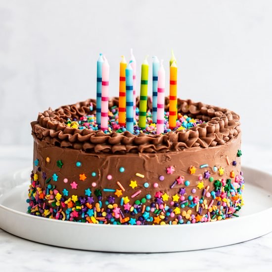 Chocolate cake with candles and sprinkles.jpg