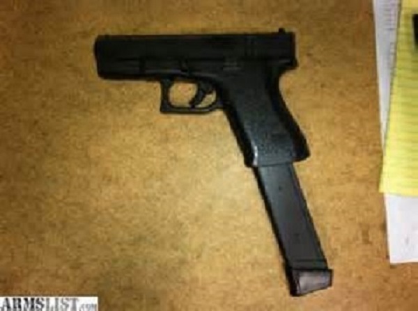 Glock 19 with extended mag_1.jpg