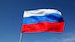 Rossiya-vvela-otvetnye-sanktsii-stock-footage-big-russian-tricolor-flag-flutters-in-wind-against-blue-sky.jpg