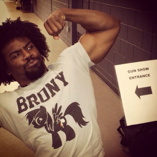 Xavier-Woods-Wearing-White-T-Shirt.jpeg