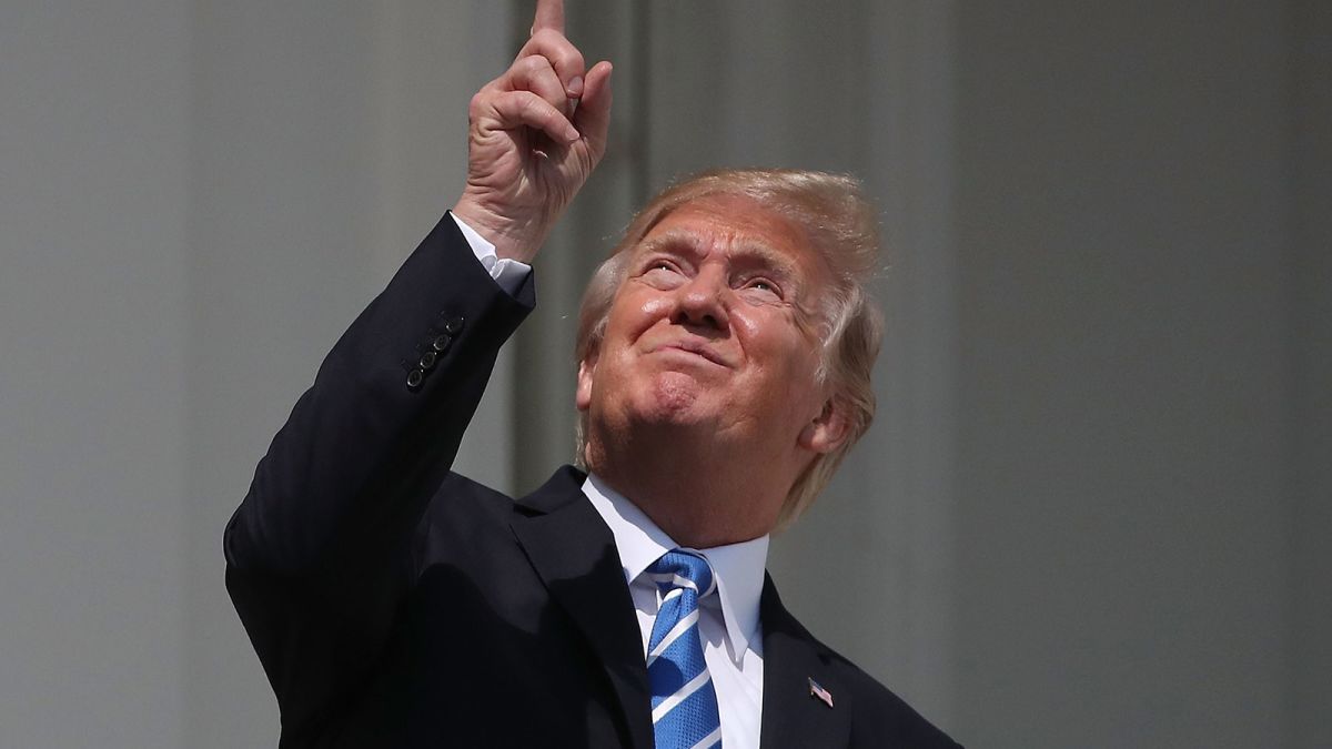 https___cdn.cnn_.com_cnnnext_dam_assets_170821152317-donald-trump-squint-point-eclipse.jpg